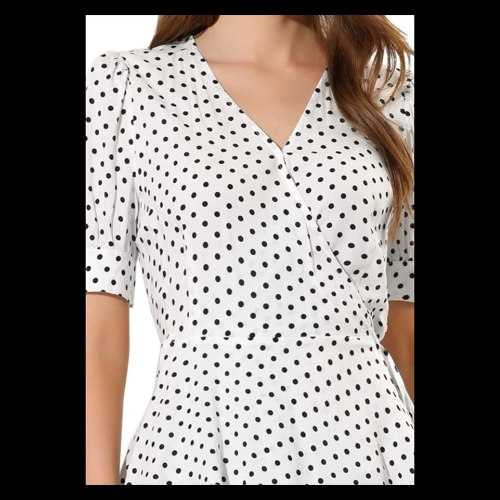 White and black polkadot blouse.